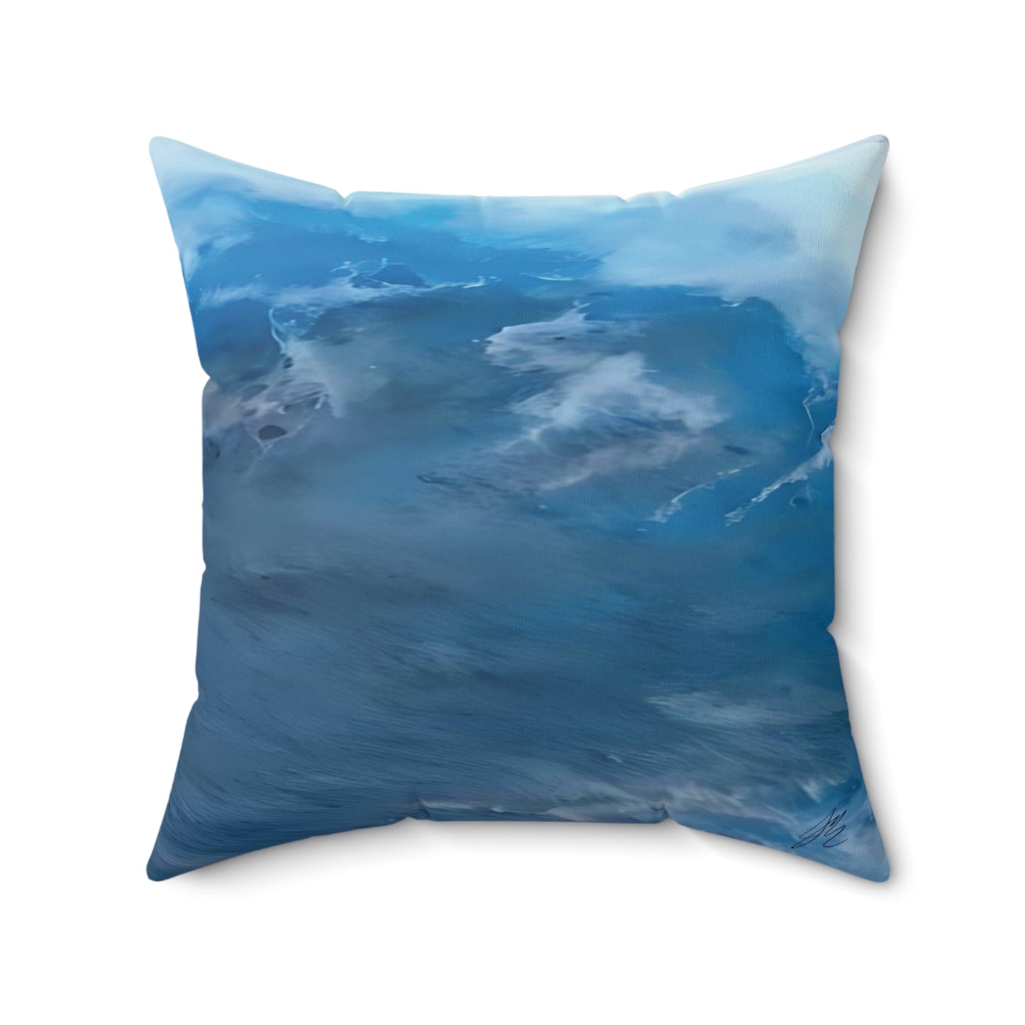 Pillow with a blue ocean wave design on a white background Style By Jess
