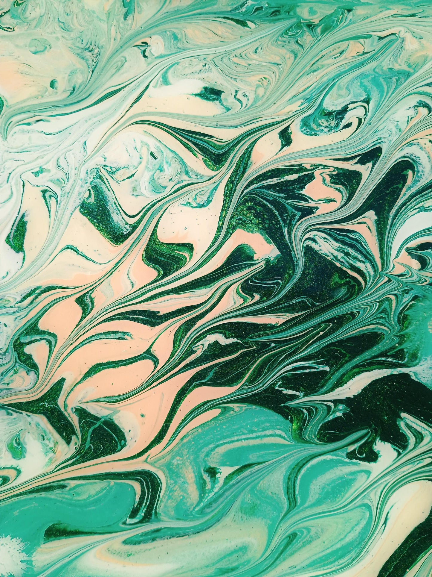 Marbled pattern with green, pink, and black colors