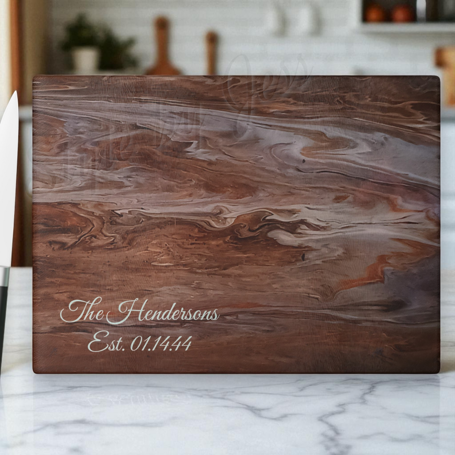 Wooden cutting board with engraved text on a marble surface
