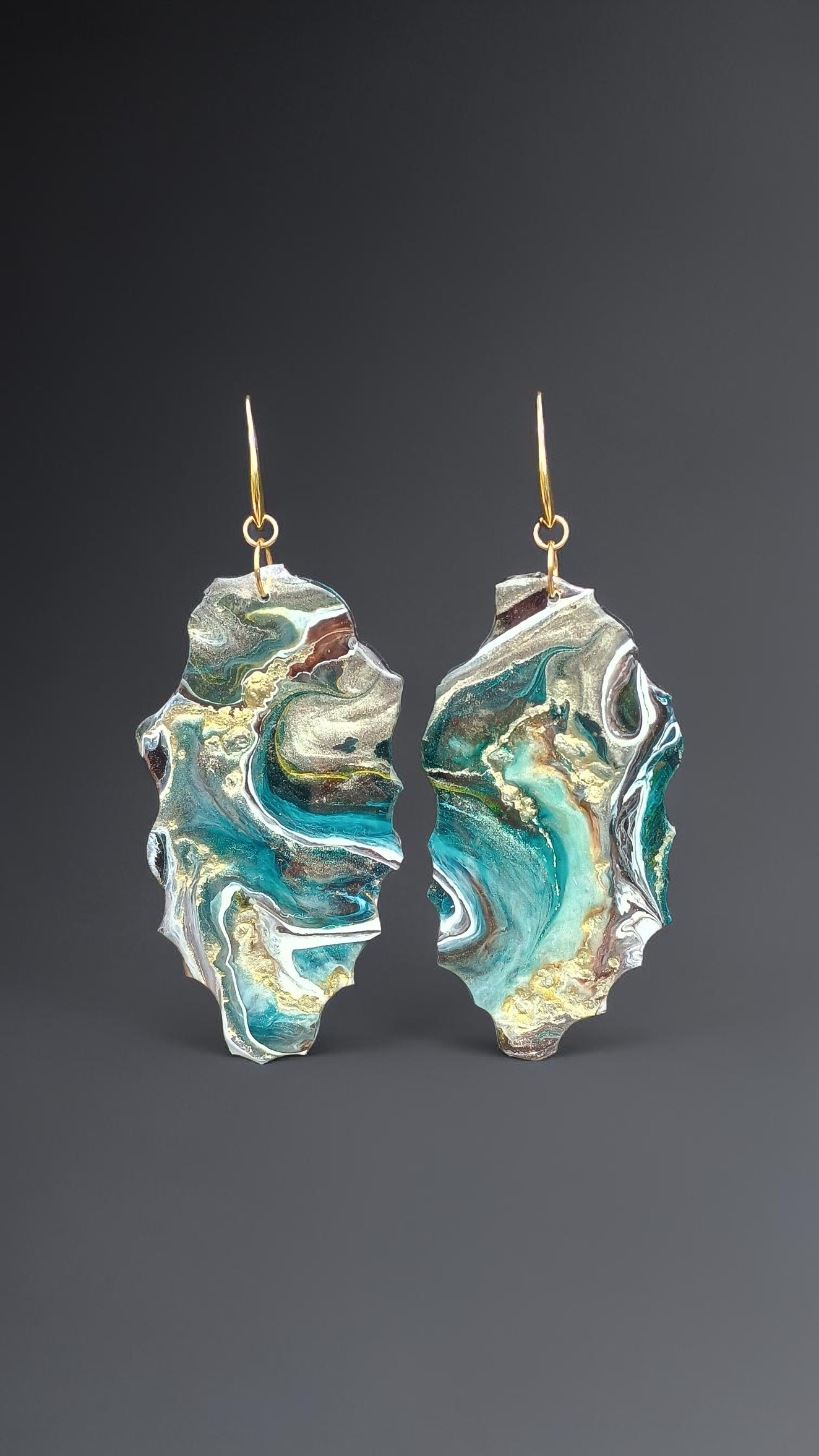 Pair of marbled teal and gold earrings on a dark gray background a perfect gift for her from Style By Jess
