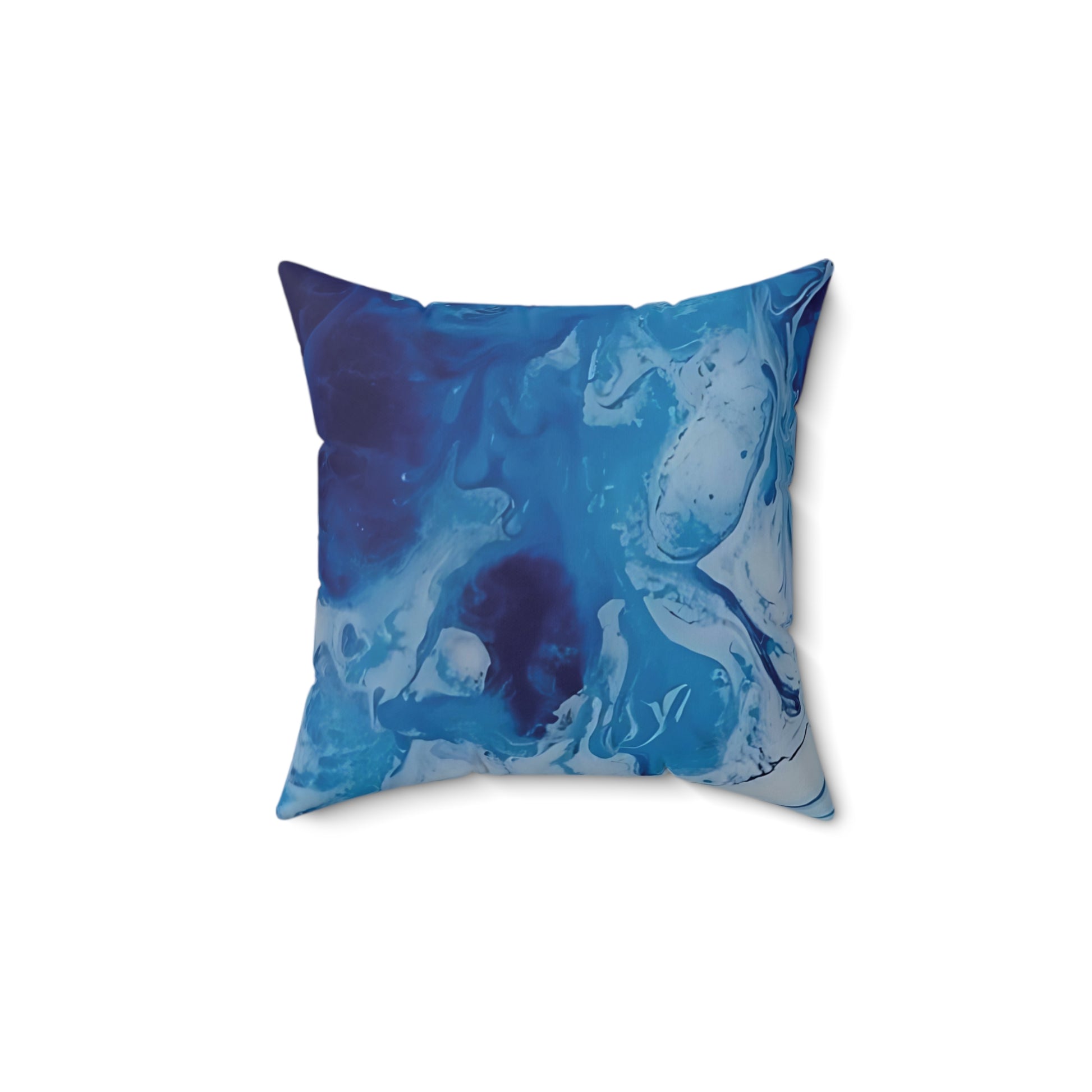 Blue abstract patterned pillow on a white background