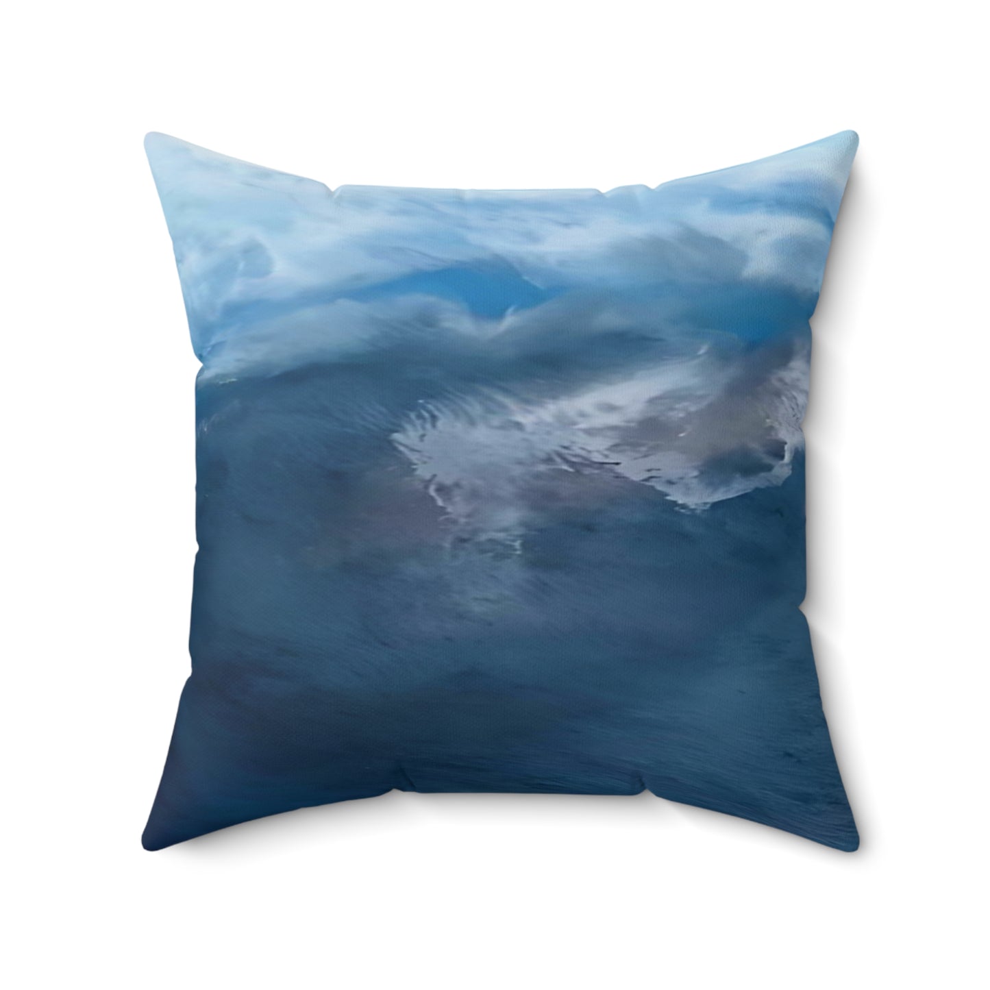 Pillow with ocean wave design on a white background Style By Jess