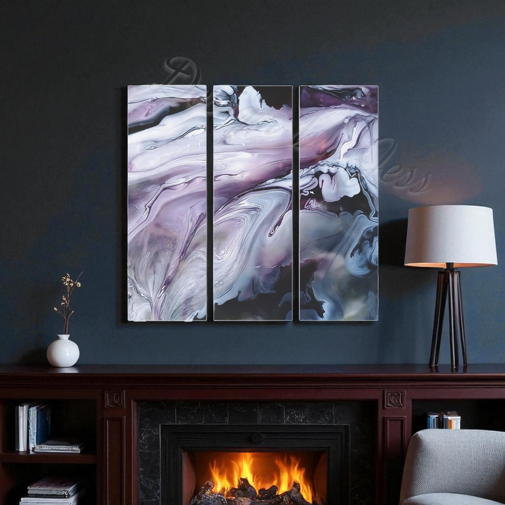 Abstract art triptych on a dark wall above a fireplace with a lamp and books.