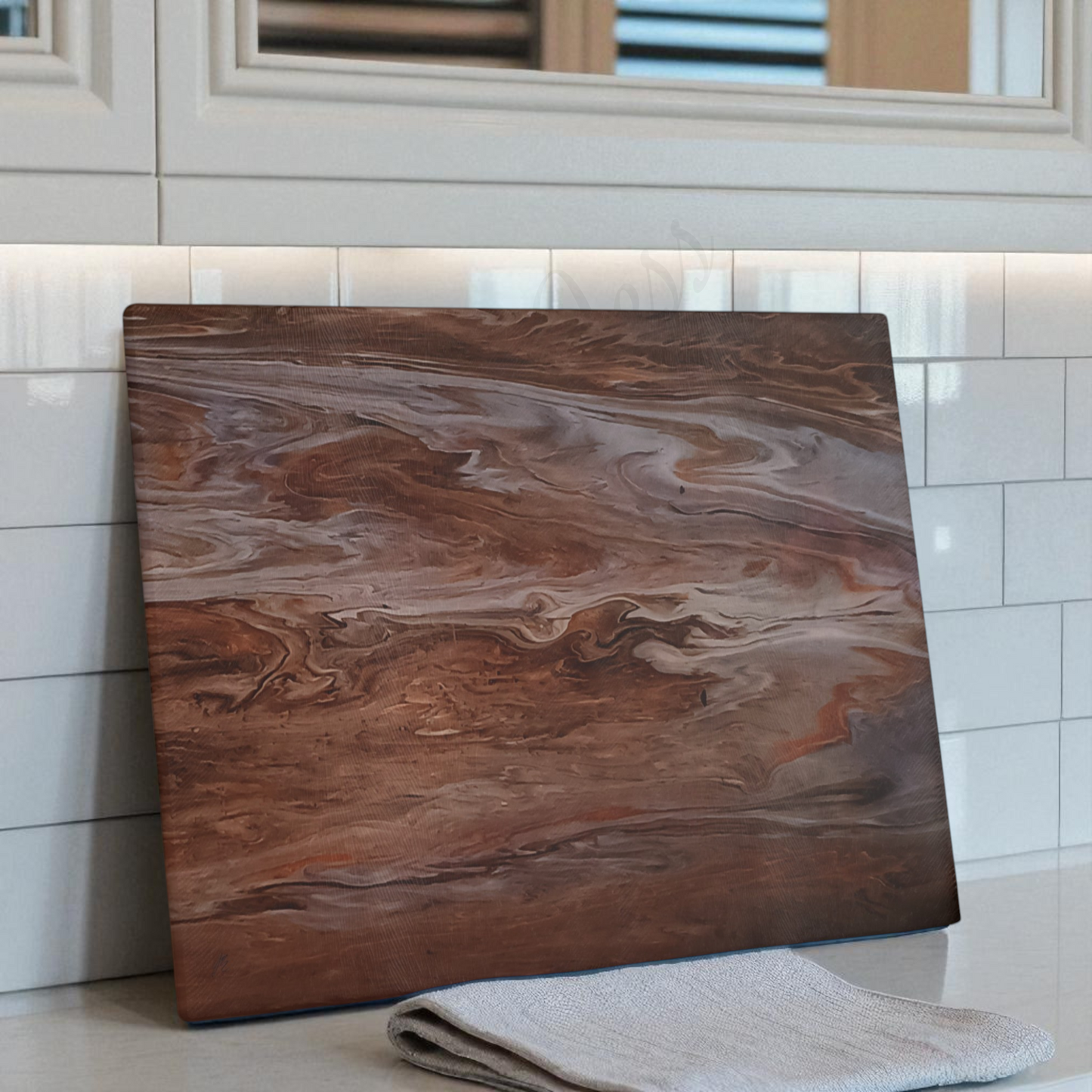 Glass cutting board that looks like wood with marble-like pattern on a tiled bathroom floor