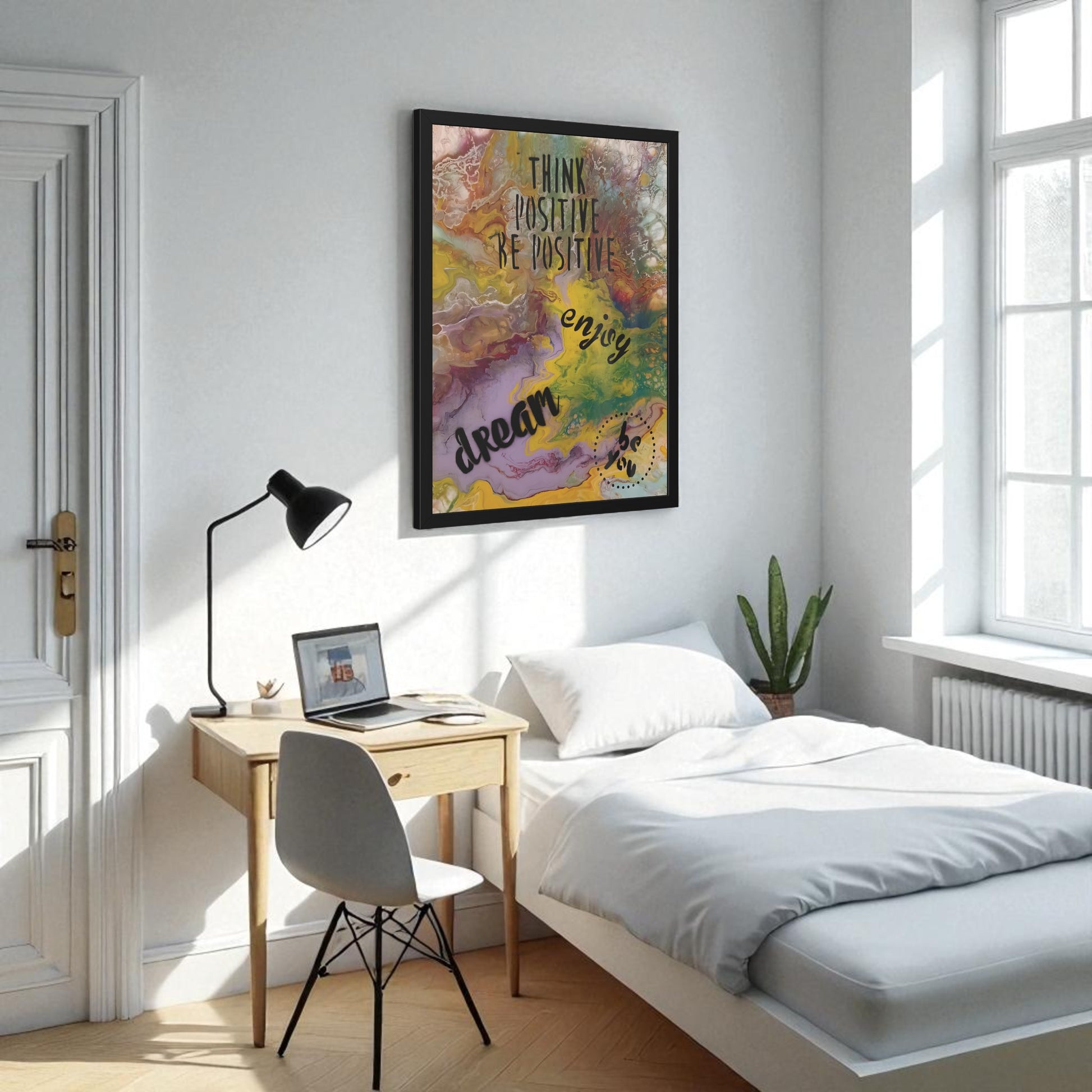 Modern bedroom with a desk, chair, and motivational poster on the wall.