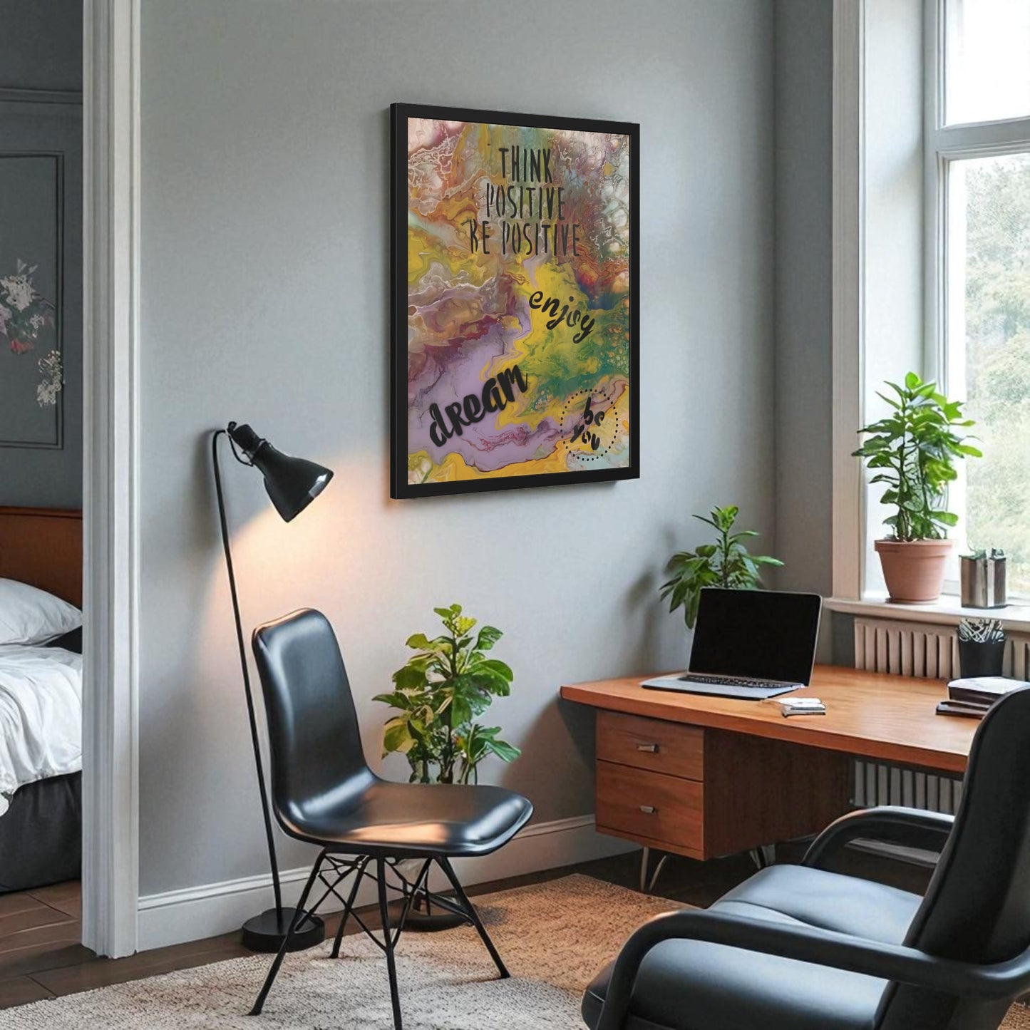 Home office with a desk, chairs, plants, and motivational wall art. Style by Jess