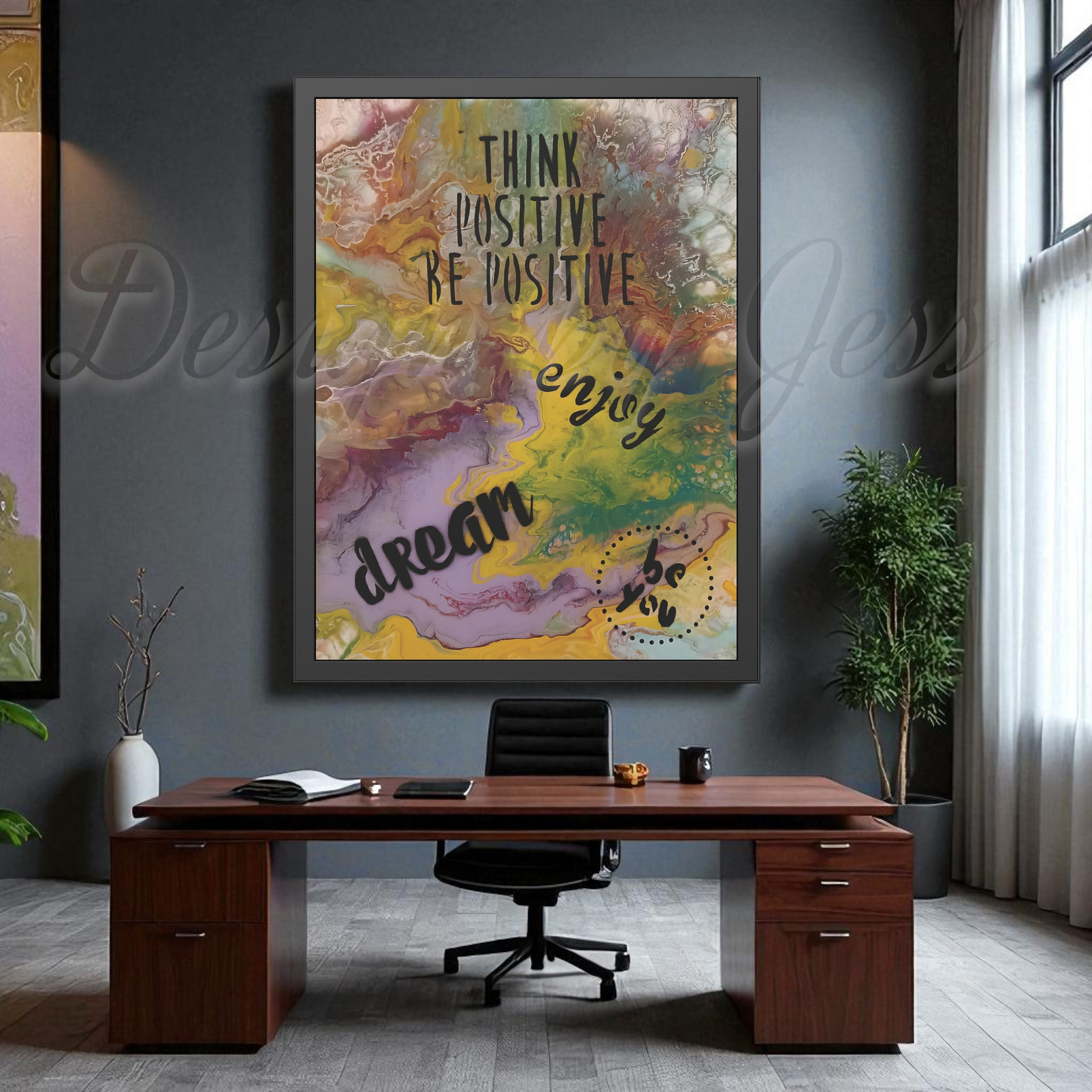 Decorative office with motivational wall art, desk, and chair.