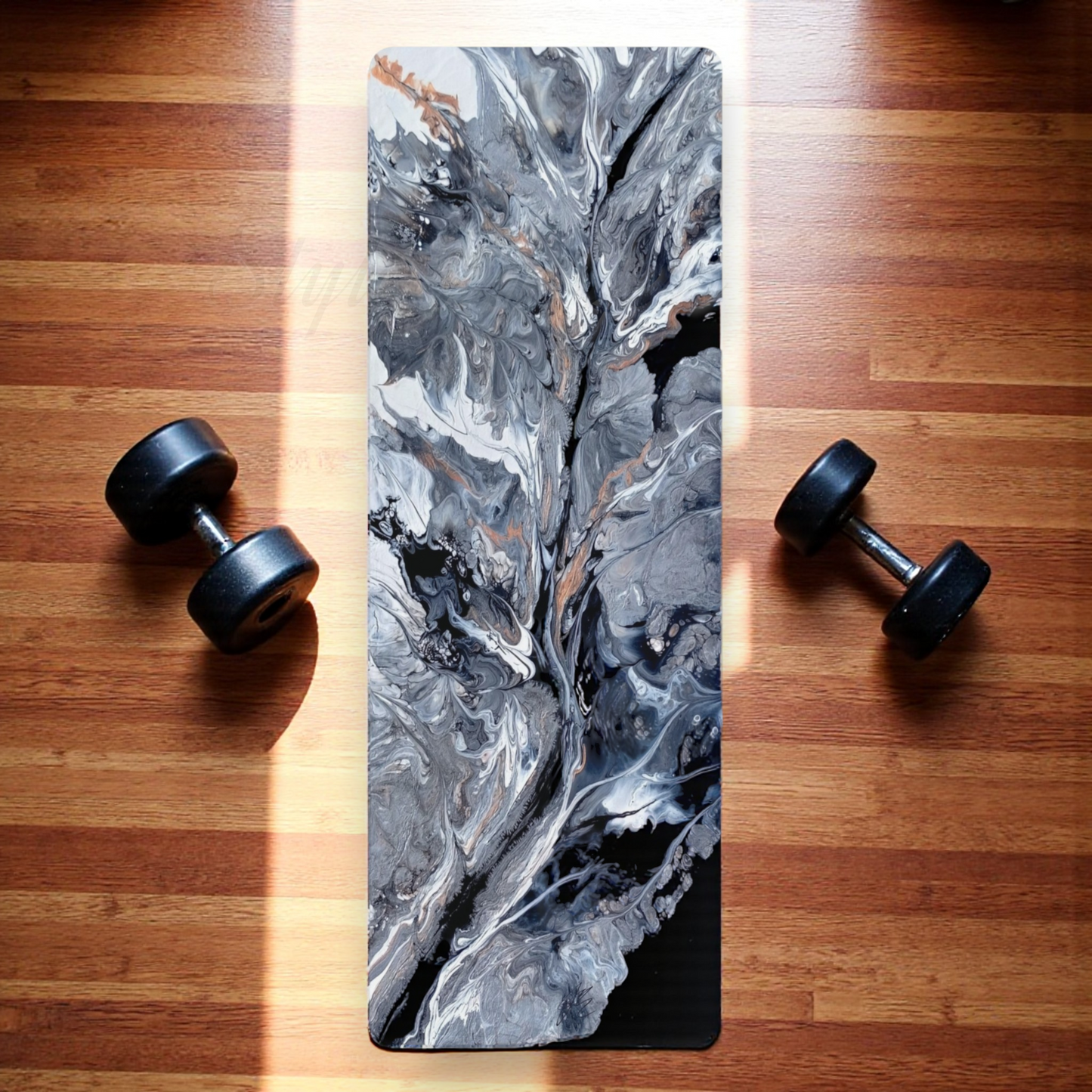 Marble-patterned yoga mat with two dumbbells on a wooden floor