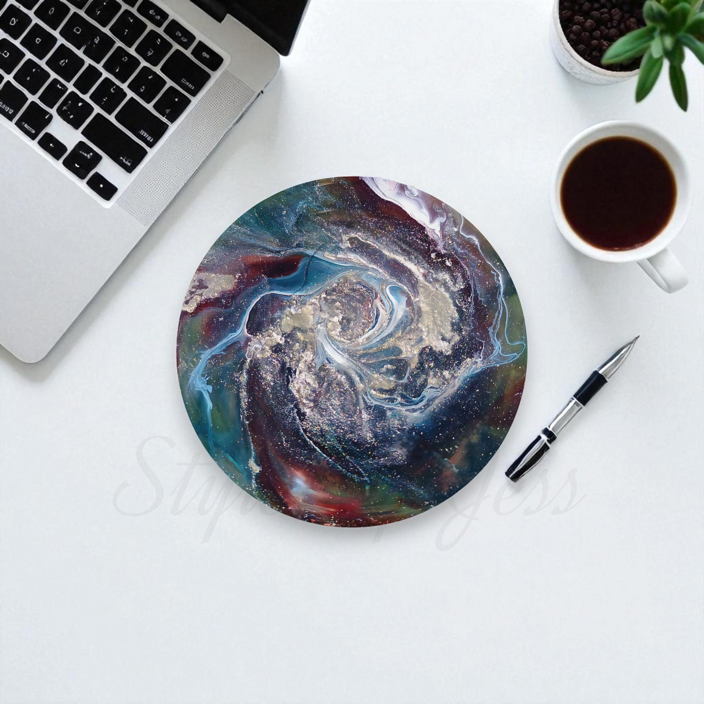 Round marbled mouse pad on a desk with a laptop, coffee cup, and pen a Style By Jess