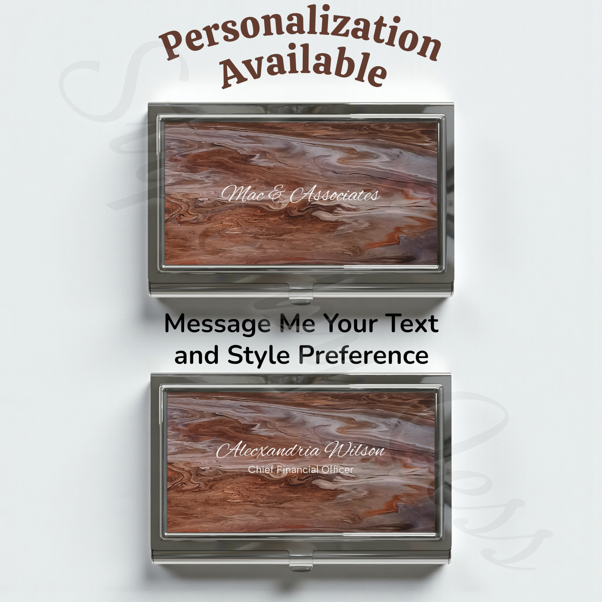 Two metal business card holders with  a custom artistic design, engraved names on a white background