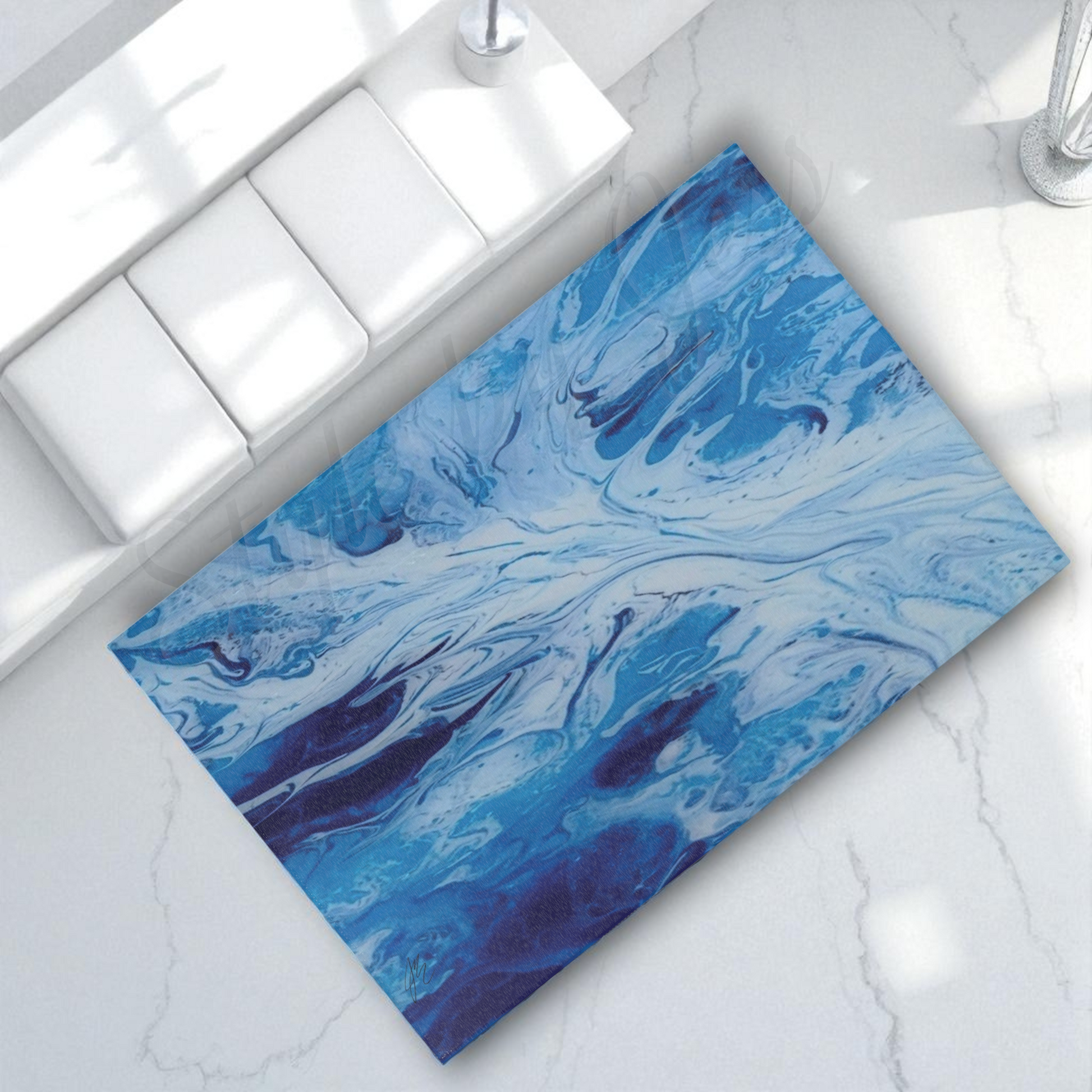 Blue and white marbled rug on a marble floor