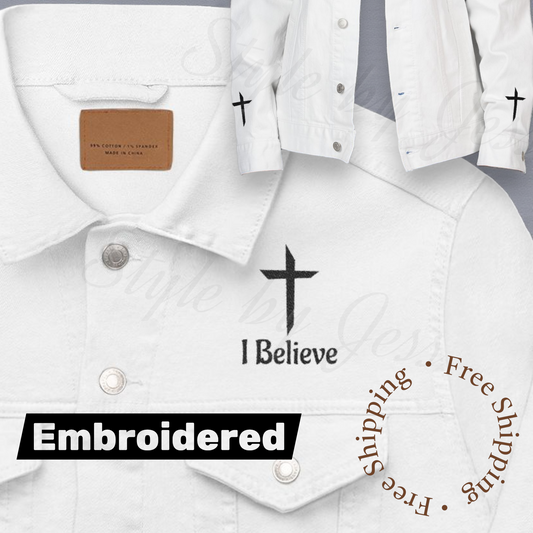 White jean jacket with black embroidered text and crosses on a white background a Gotta Have Faith Series