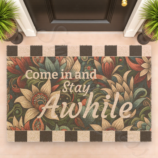 Decorative doormat with floral design and text 'Come in and Stay Awhile' on a checkered border a Style by Jess