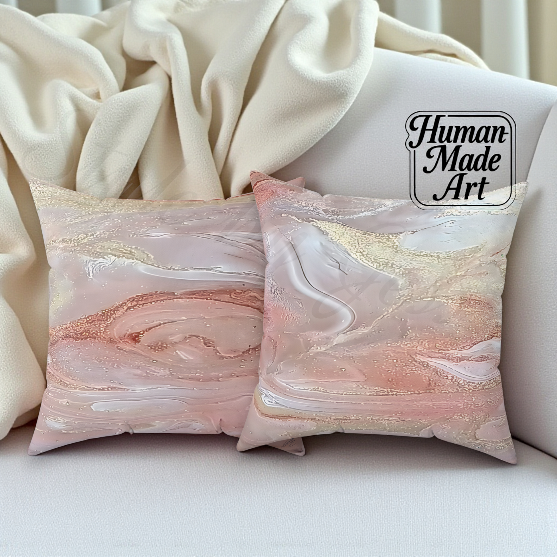 Decorative pillows with marble pattern on a couch, featuring 'Human Made Art' branding.