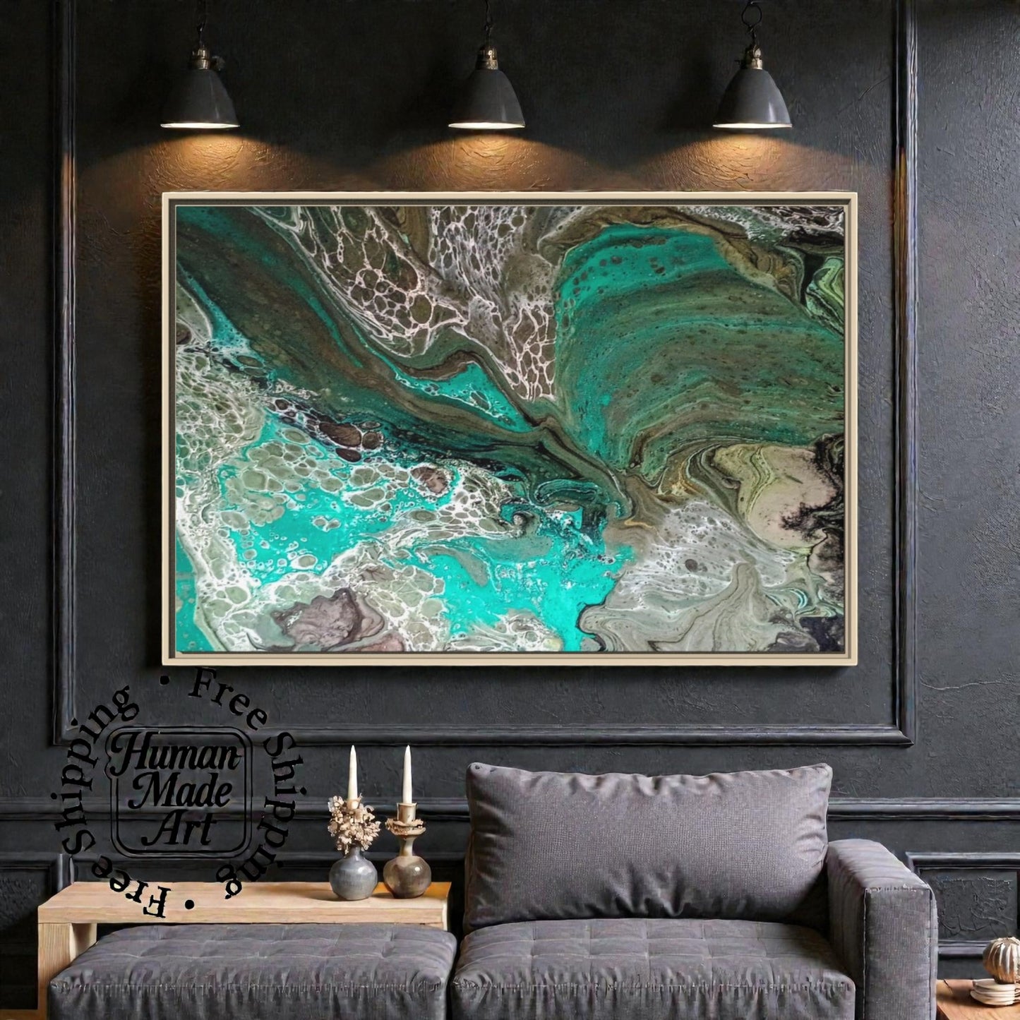 Abstract art piece in a floating frame on a dark wall above a gray sofa in a modern home game room.