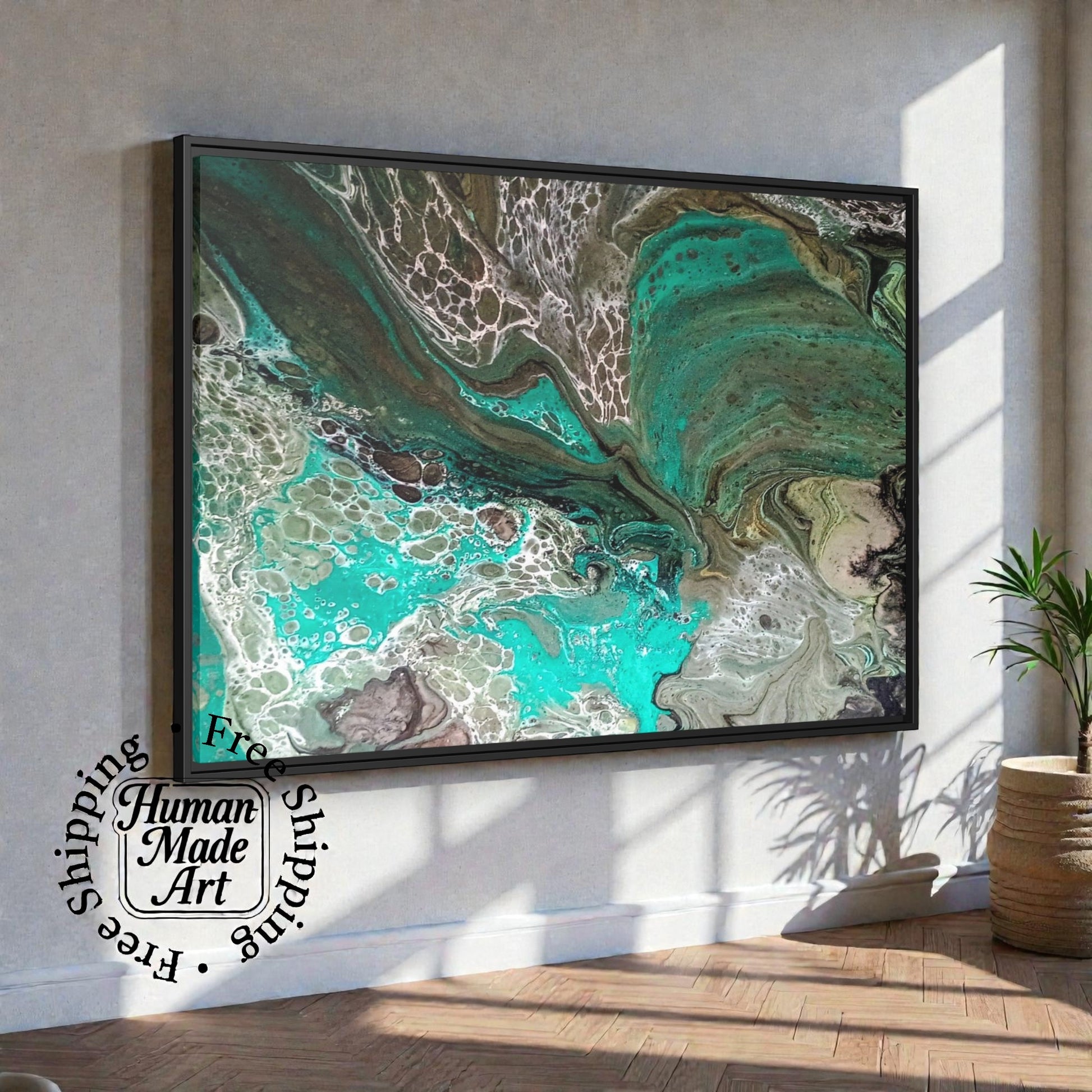 Framed Canvas abstract art piece in a boho style  interior setting with a plant and 'Human Made Art' branding.