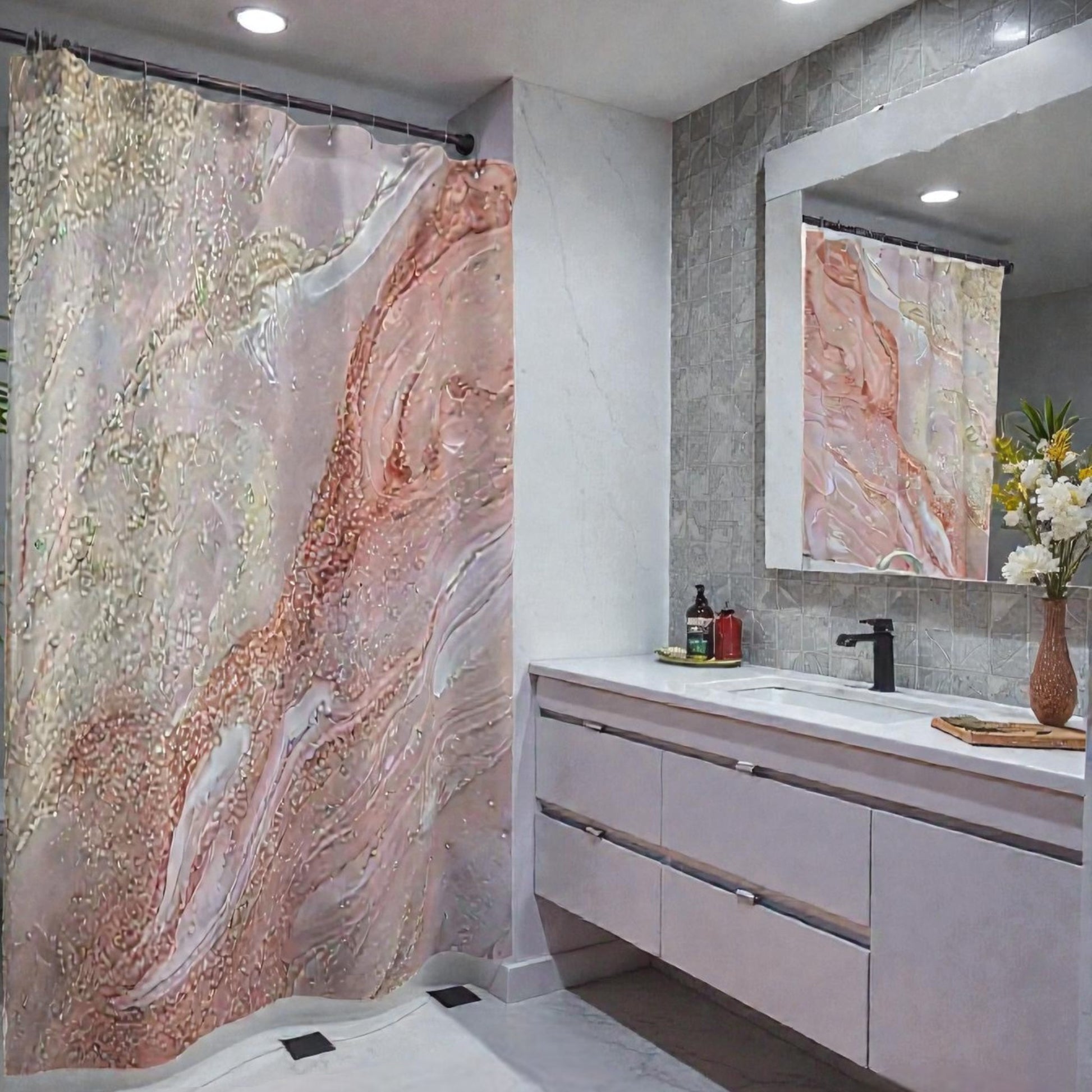 Bathroom with marble-patterned shower curtain  and vanity area with gold, white, blush and cream colors. 