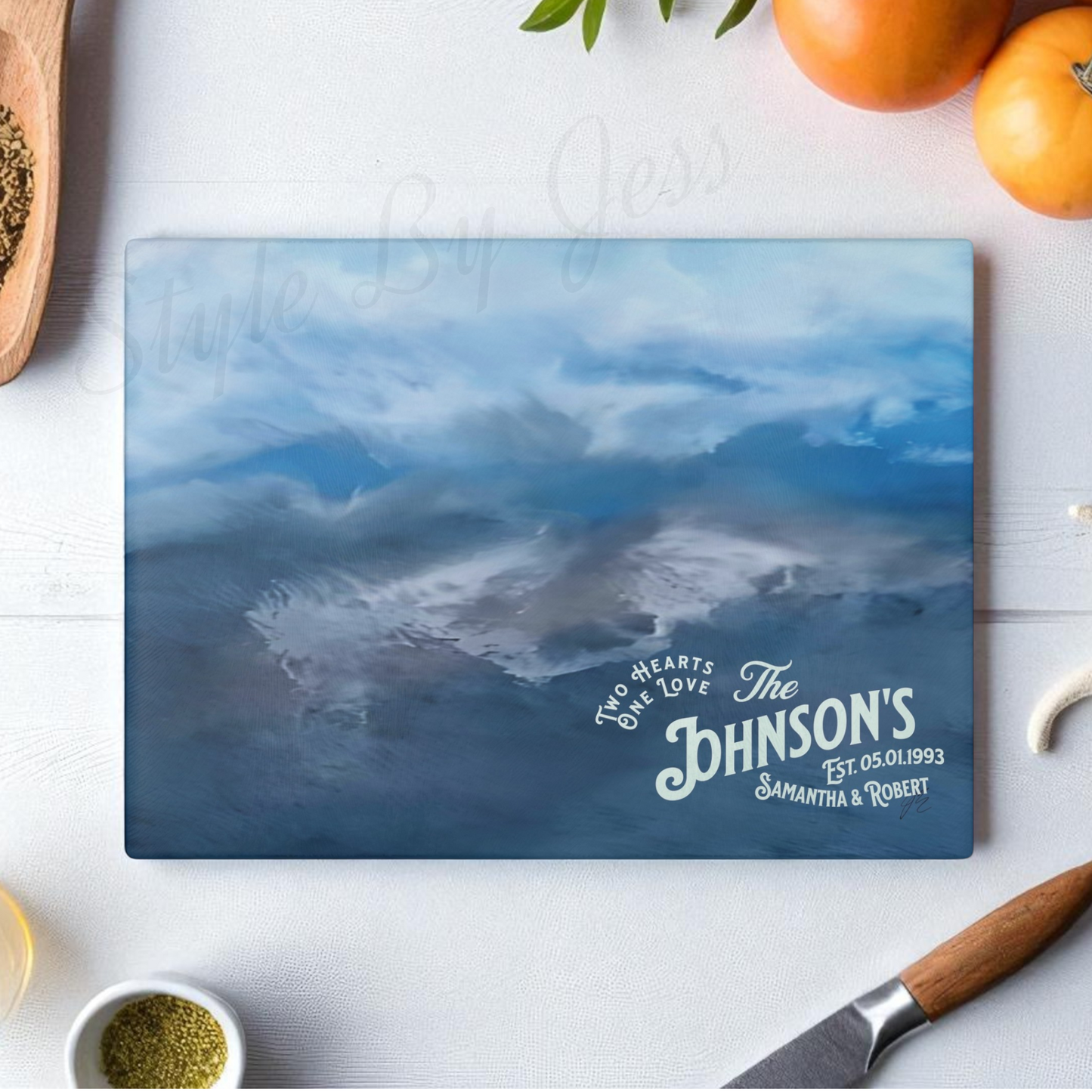 Personalized cutting board with ocean design and 'Johnson's' family name on a kitchen counter. Style by Jess