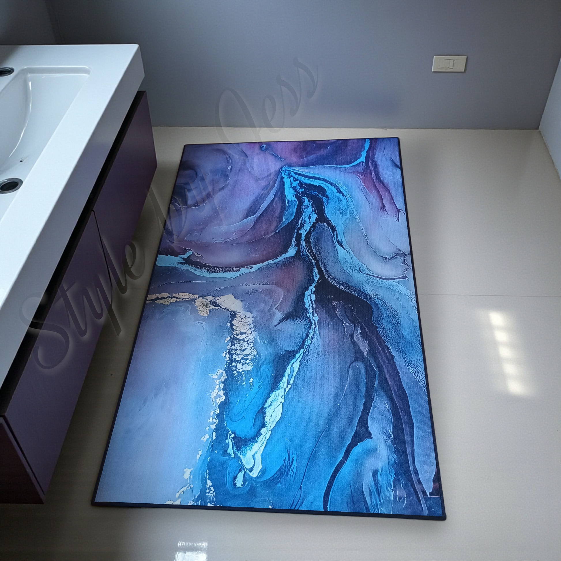 Abstract art piece on a white surface with a blurred background