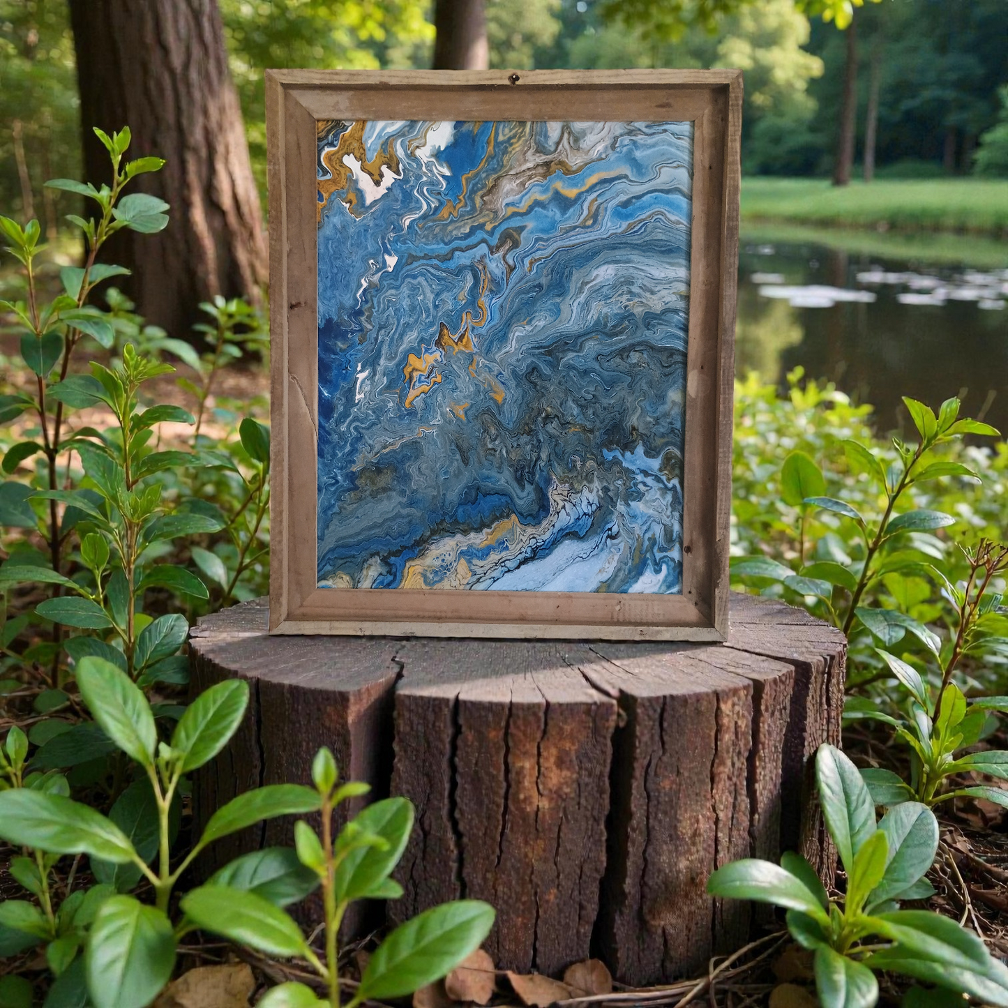 Framed one of a kind human made abstract painting on a wooden stump with a natural background a Style By Jess at Gotta Have It Design. 