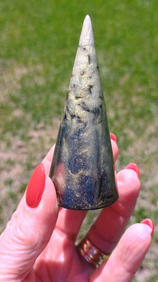 Handmade resin ring holder cone in black galaxy swirl with gold shimmer pigment and embedded black glass rock, 3.25 inches tall, one of a kind handmade resin art, custom jewelry organizer, boho vanity decor, ring dish, resin home decor by Style By Jess at Gotta Have It Design 