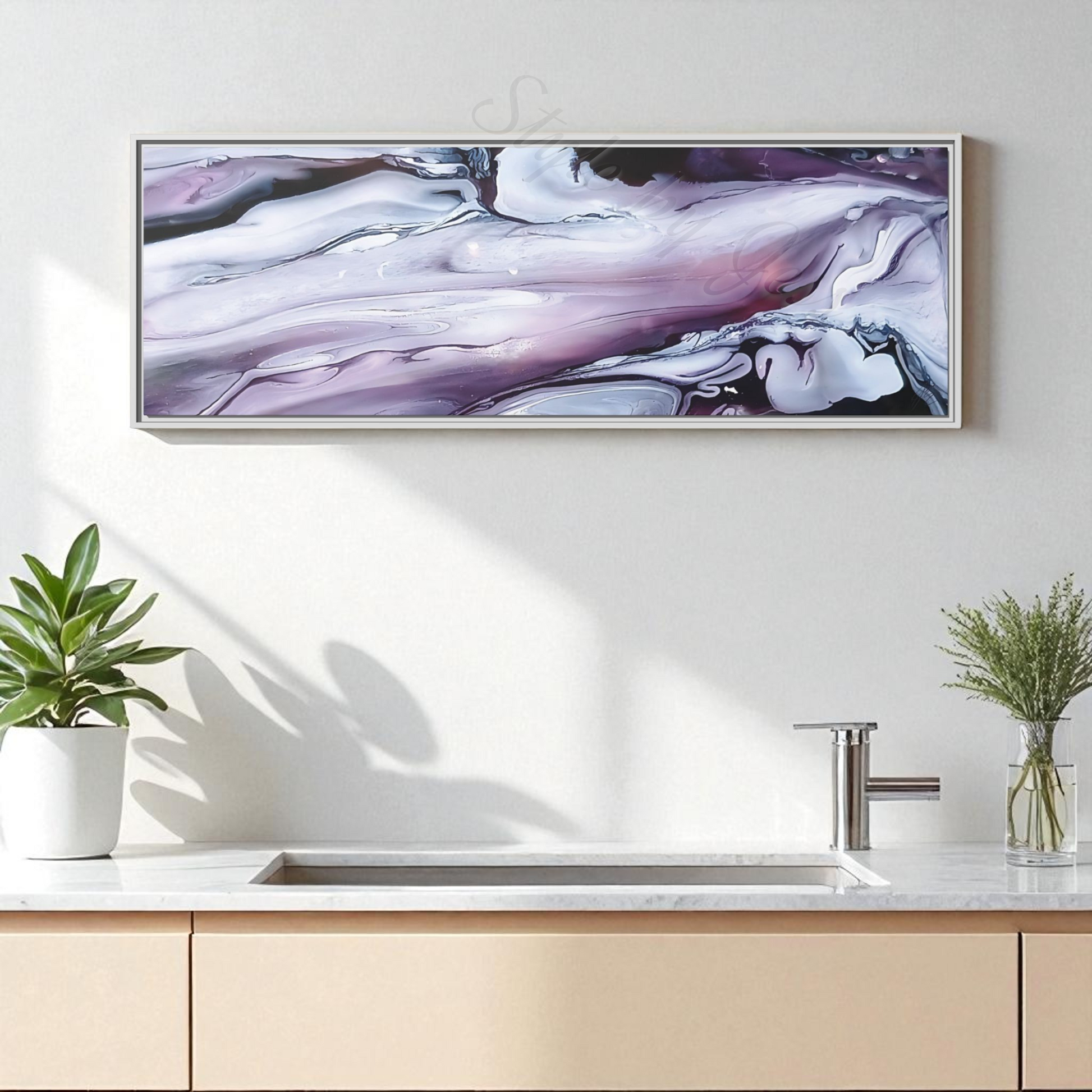 Modern kitchen with a large abstract painting on the wall