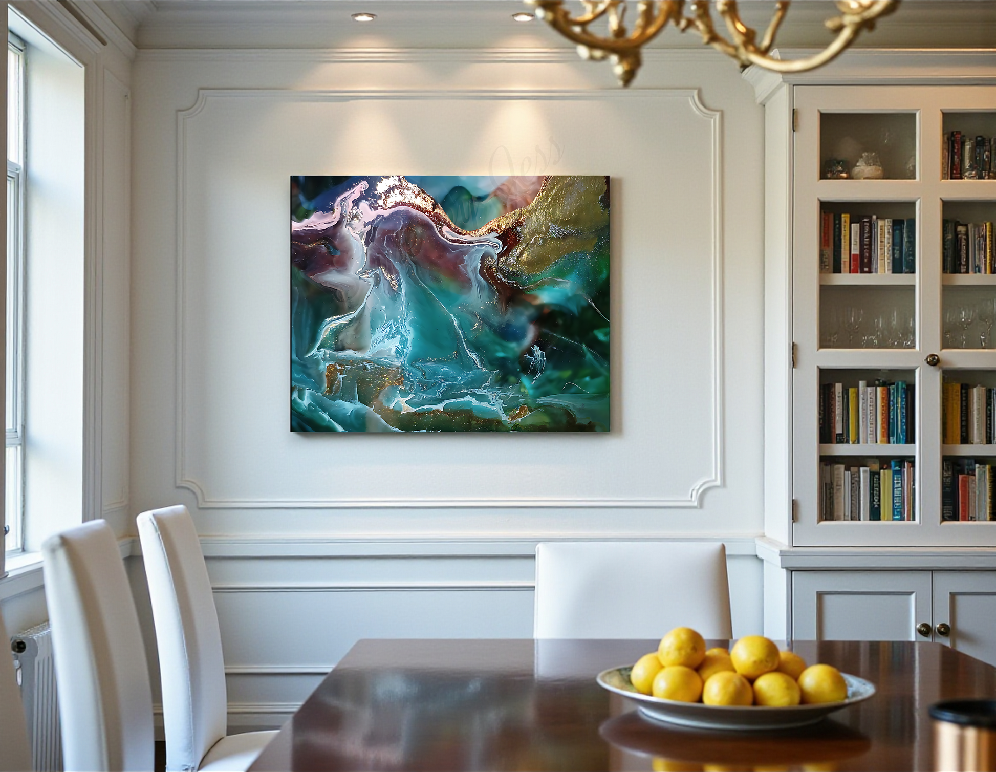 Dining room with a colorful abstract painting on the wall, a table with lemons, and a bookshelf.