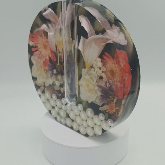 Video of handmade dried flower resin vase with garden-grown roses and lilies embedded in black and gold resin, pearl bottom, with propagation tube bud vase insert a Style By Jess at Gotta Have It Design