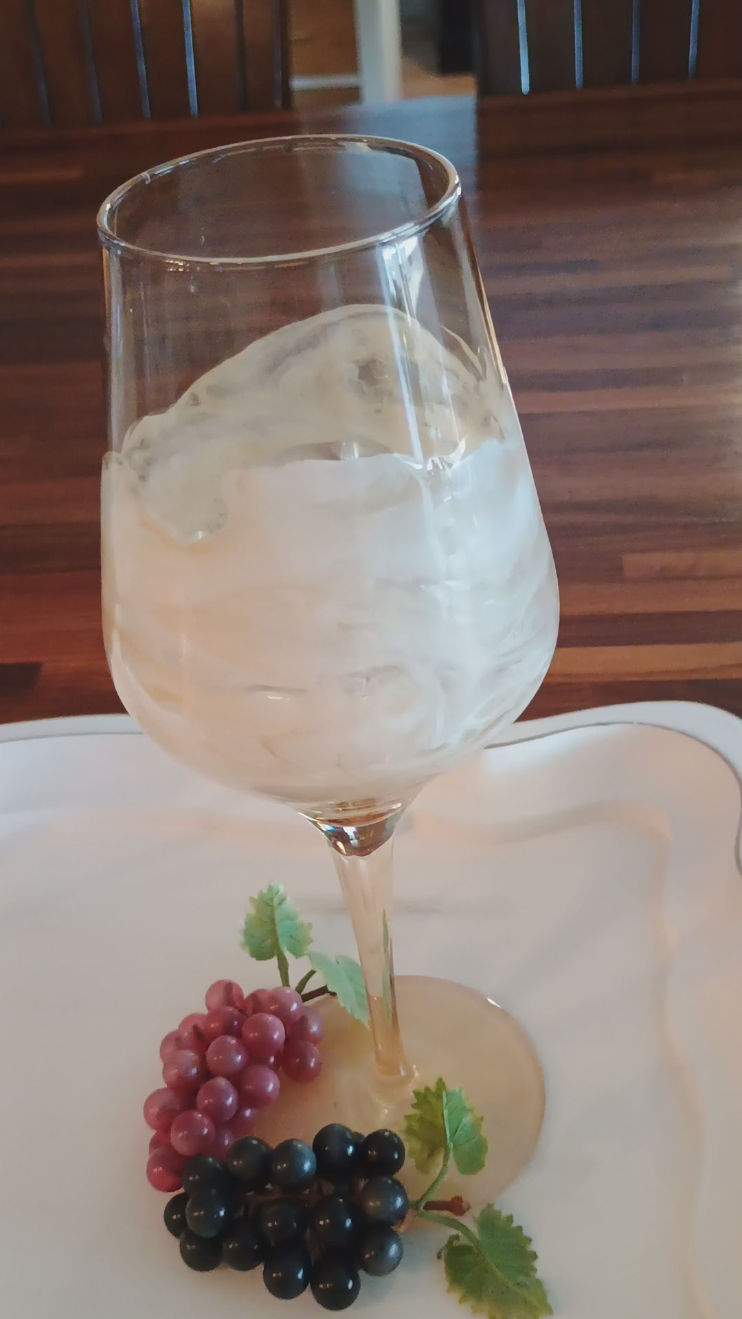 Video of amber wine glass with handmade white resign marble like accents a Style by Jess