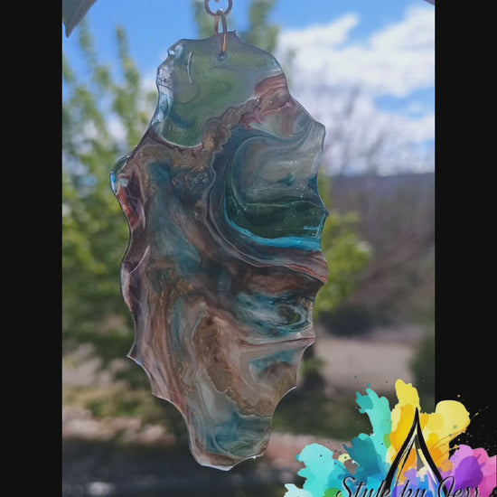 Video of custom earrings created using resin and inks a Style By Jess at Gotta Have It Design. 
