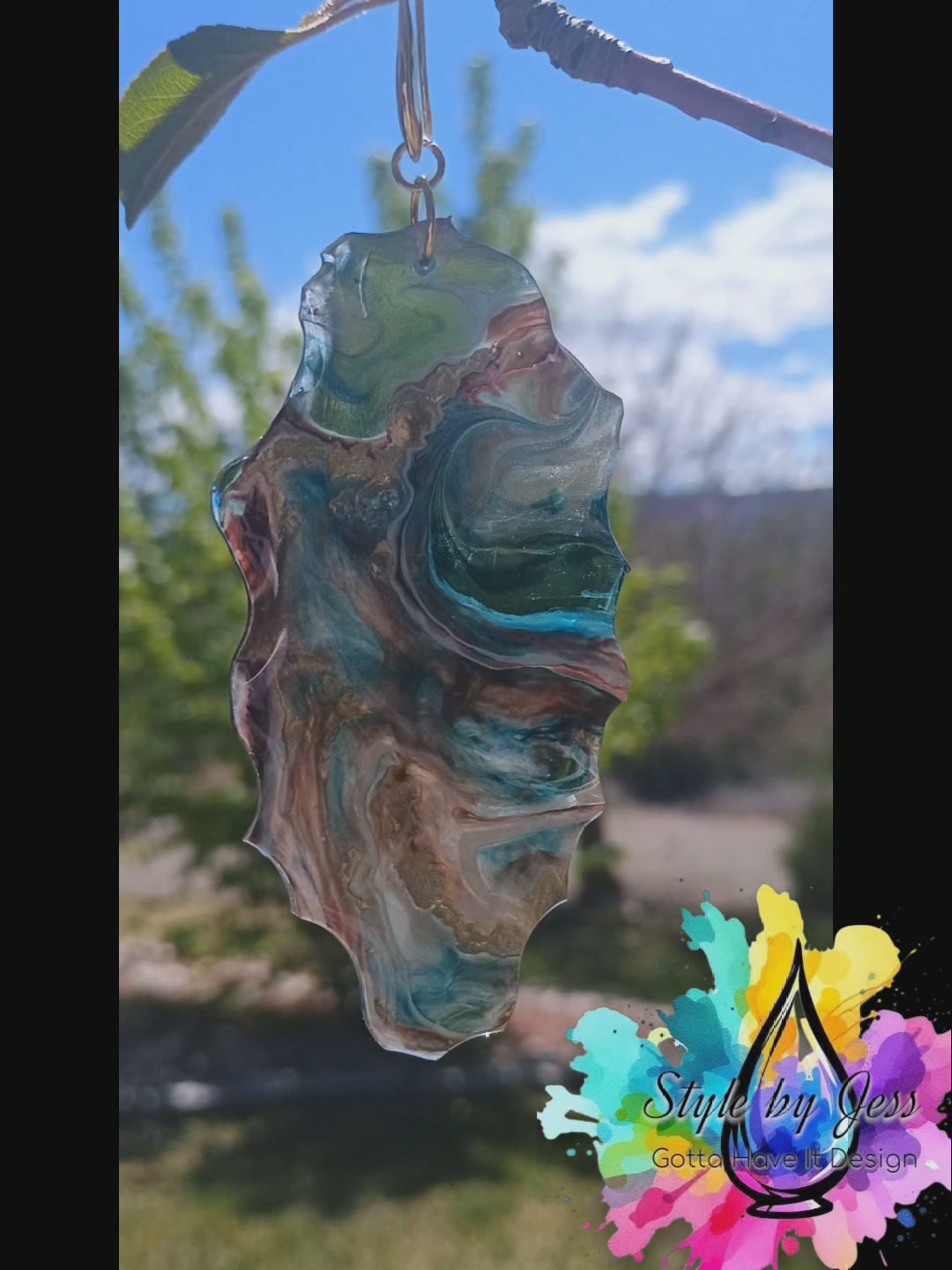 Video of custom earrings created using resin and inks a Style By Jess at Gotta Have It Design. 