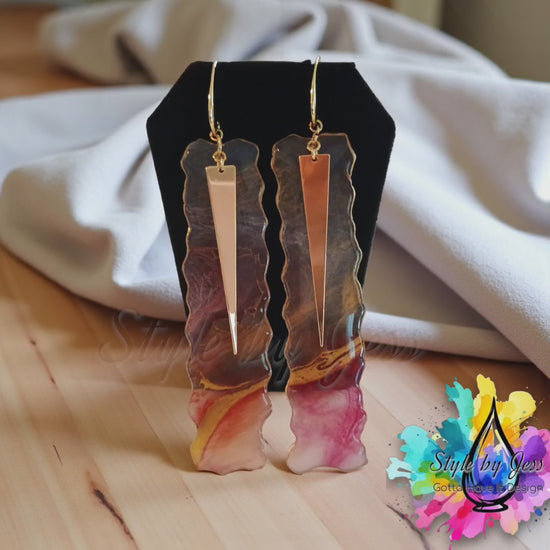 Video of handmade abstract resin geometric earrings a Style By Jess