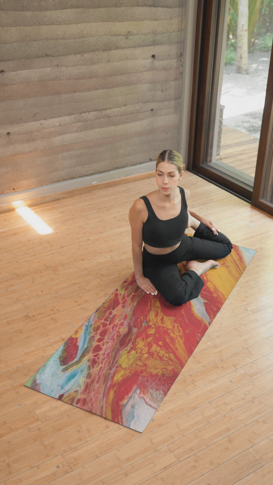 Video of woman sitting on a yoga mat exercising on a hardwood floor.  Style by Jess
