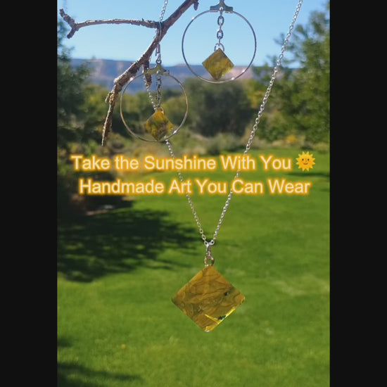 Video of yellow handmade jewelry set with a natural green landscape in the background a Style By Jess at Gotta Have It Design