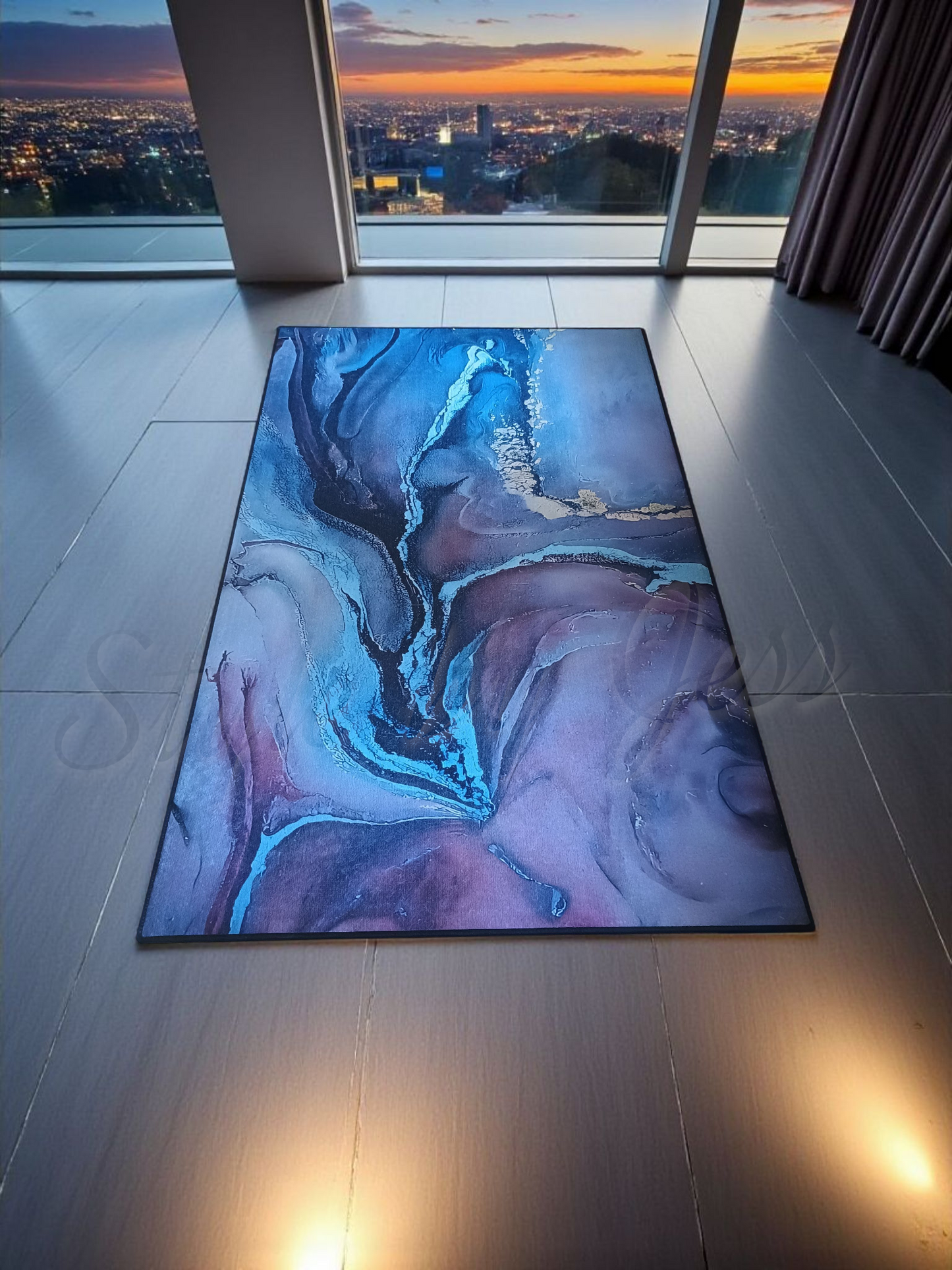 Colorful abstract rug on a tiled floor with a cityscape view through large windows.