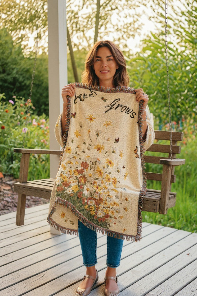 Woman holding a floral blanket with text on a wooden deck gift for her
