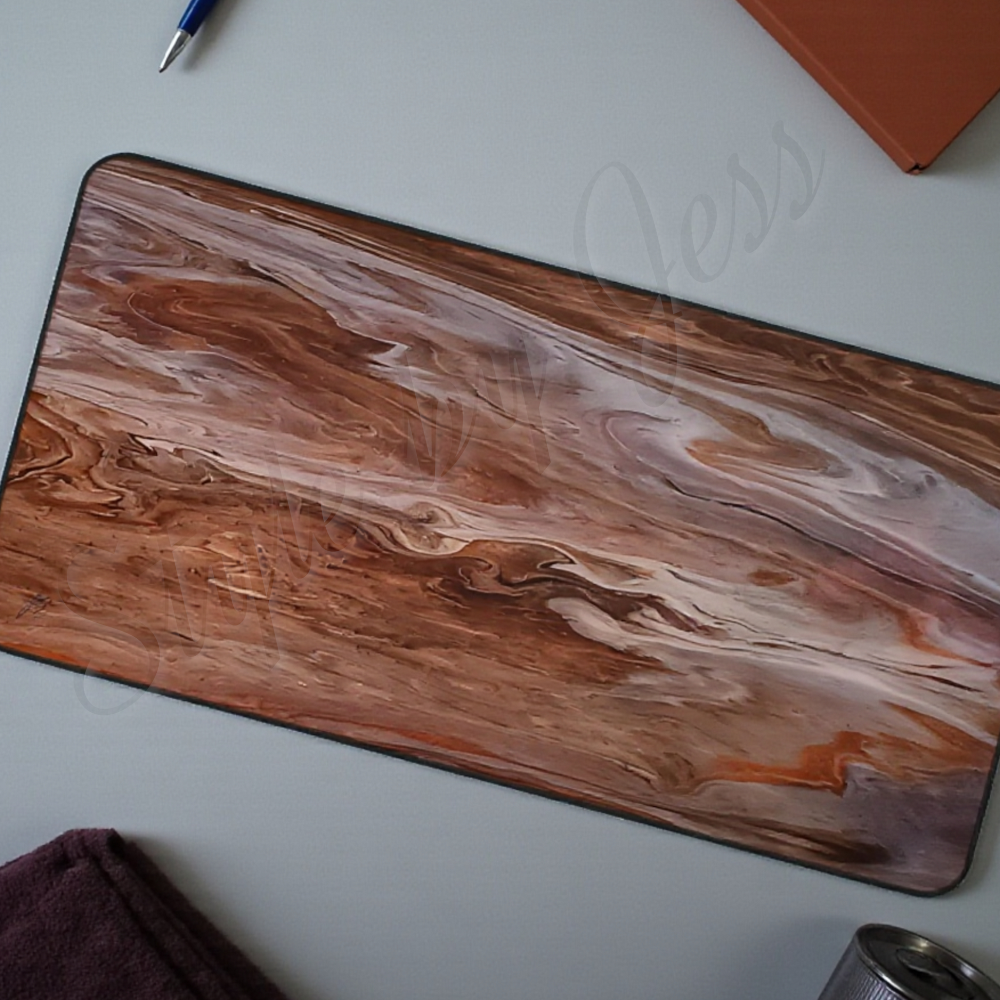 Wooden desk mat with marble pattern on a white surface in a office