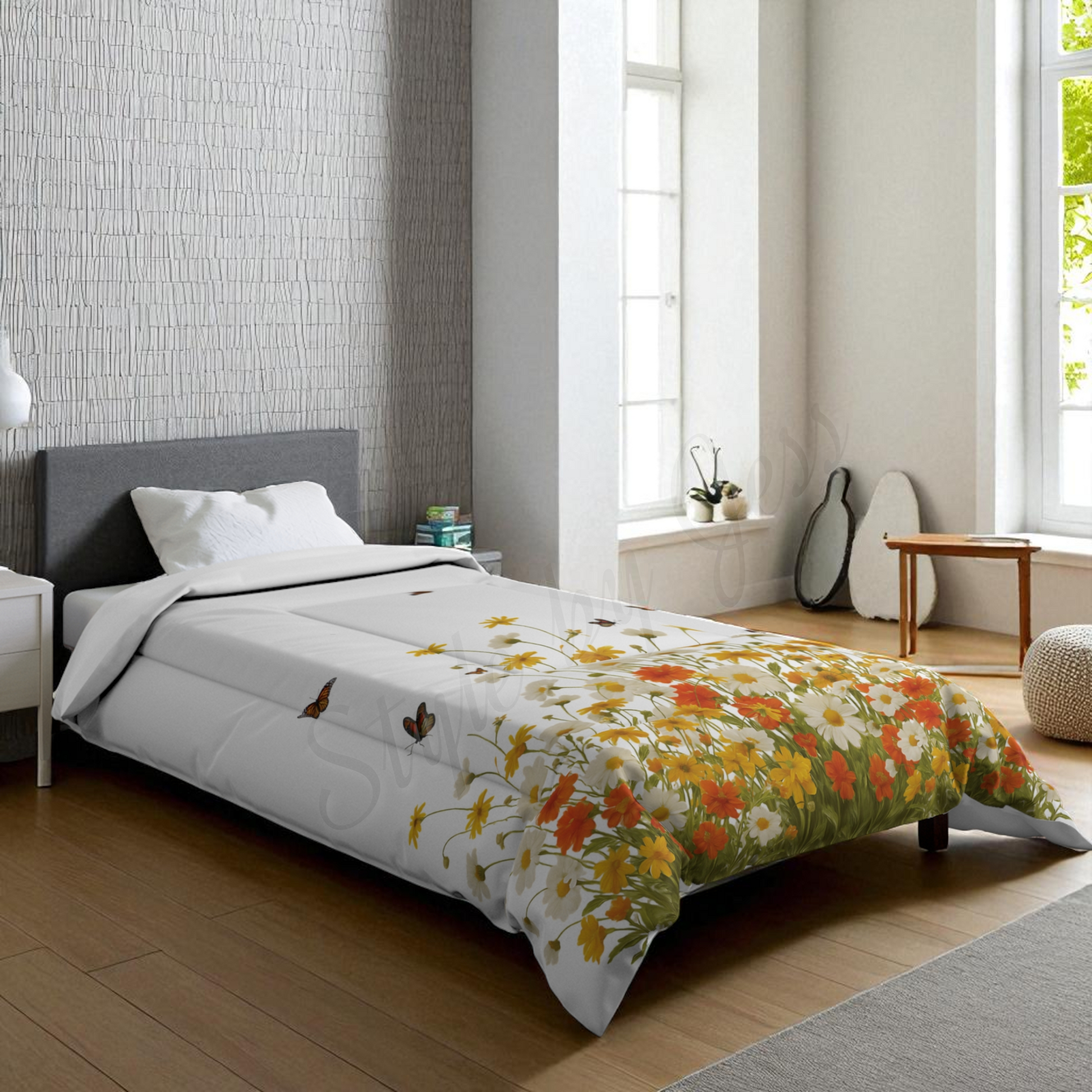 Bed with floral comforter in a bright minimalist bedroom