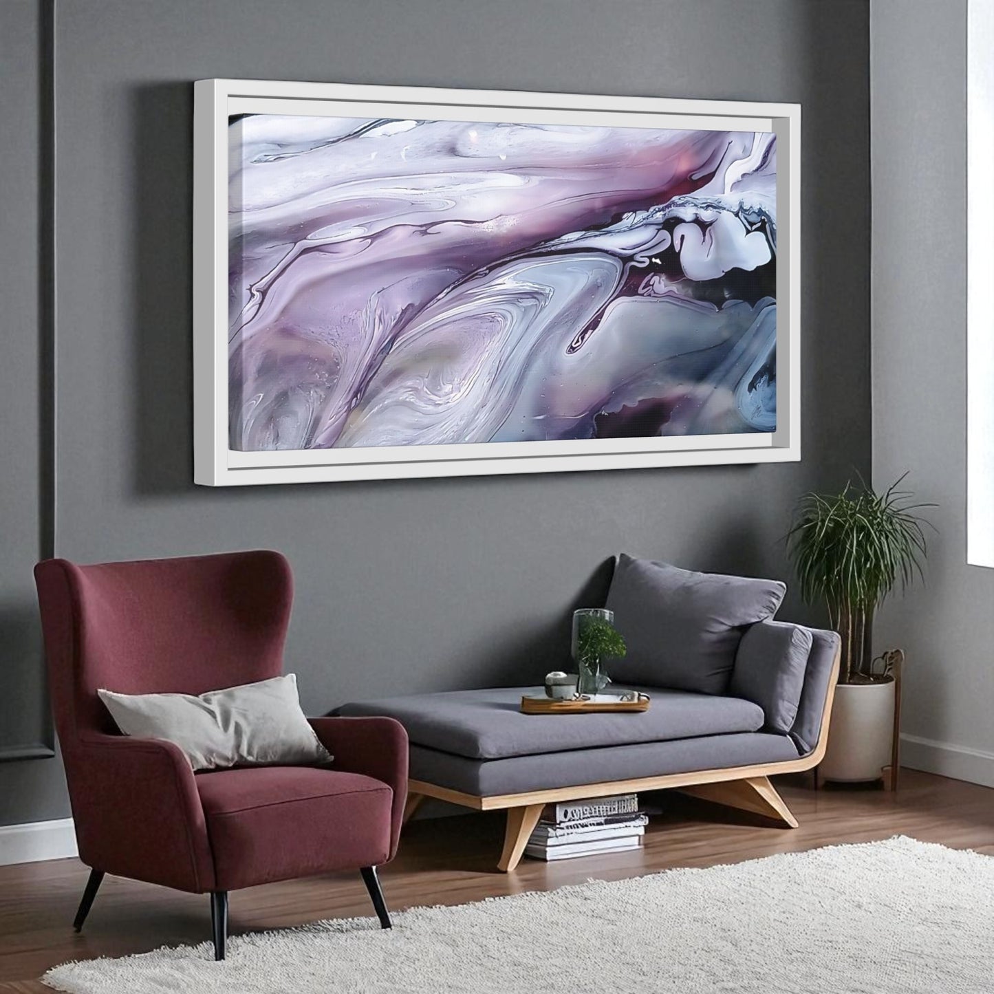 Living room with a maroon armchair, gray sofa, and abstract painting on a gray wall.