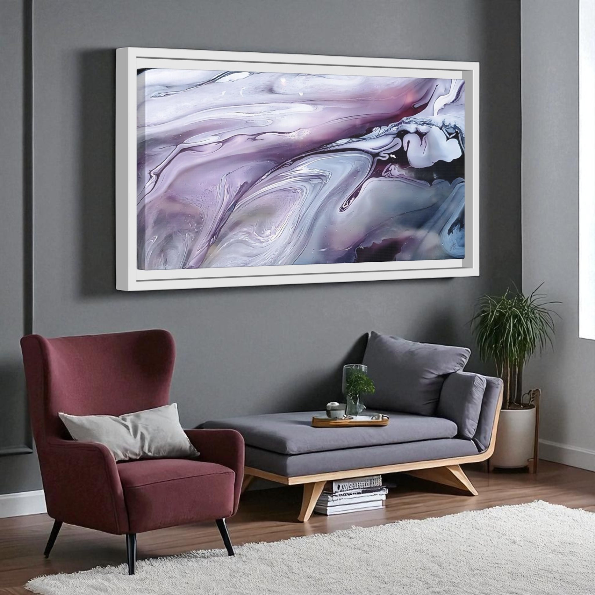 Living room with a maroon armchair, gray sofa, and abstract painting on a gray wall.