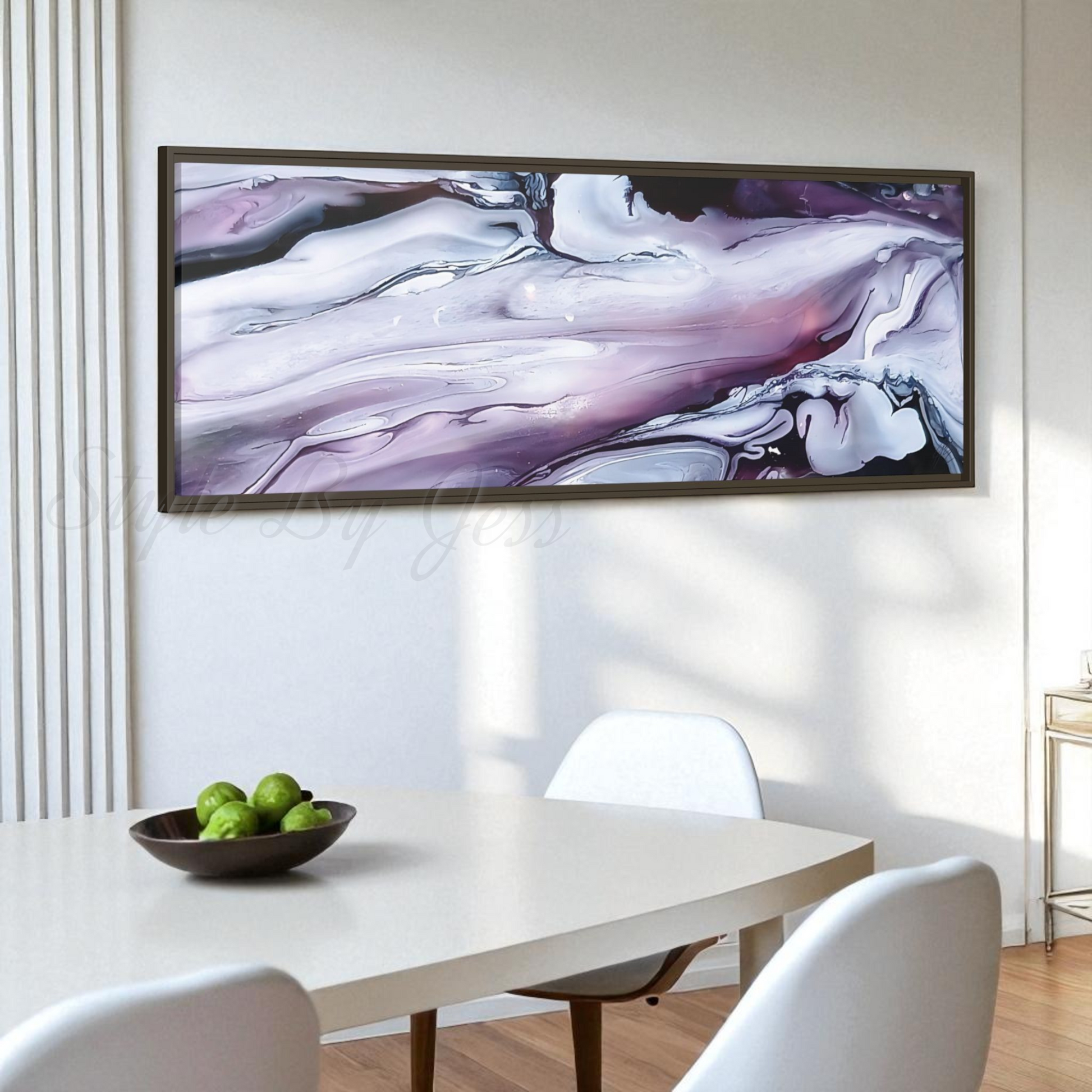 Modern interior with a large vertical abstract painting on the wall above a dining table.