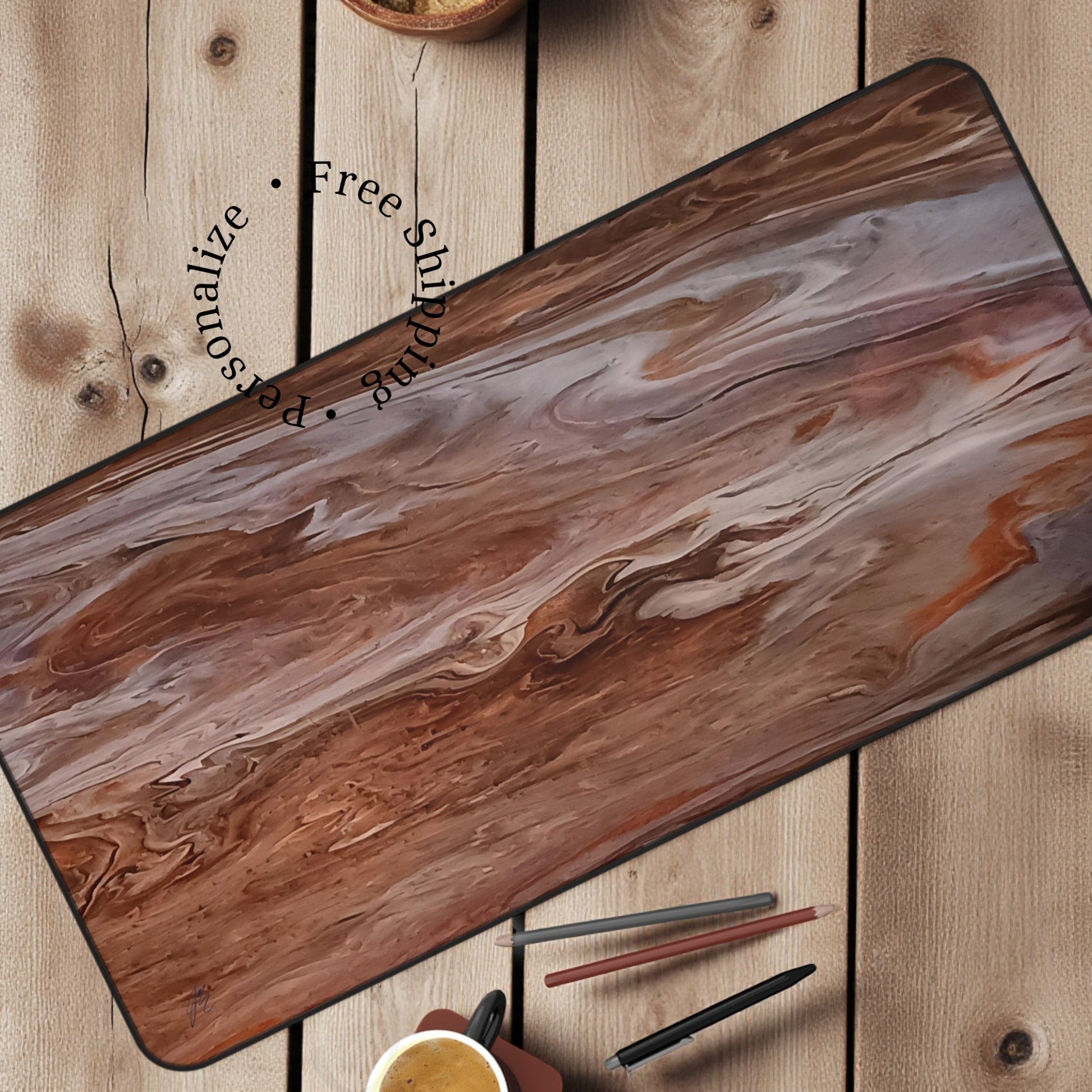 Large Desk Mat with acrylic painting print that looks like wood grain on a wooden surface