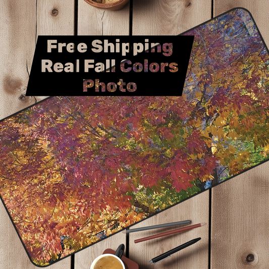 Colorful desk mat with autumn design on a wooden surface, featuring text about free shipping and real fall colors a Style by Jess at Gotta Have It Design