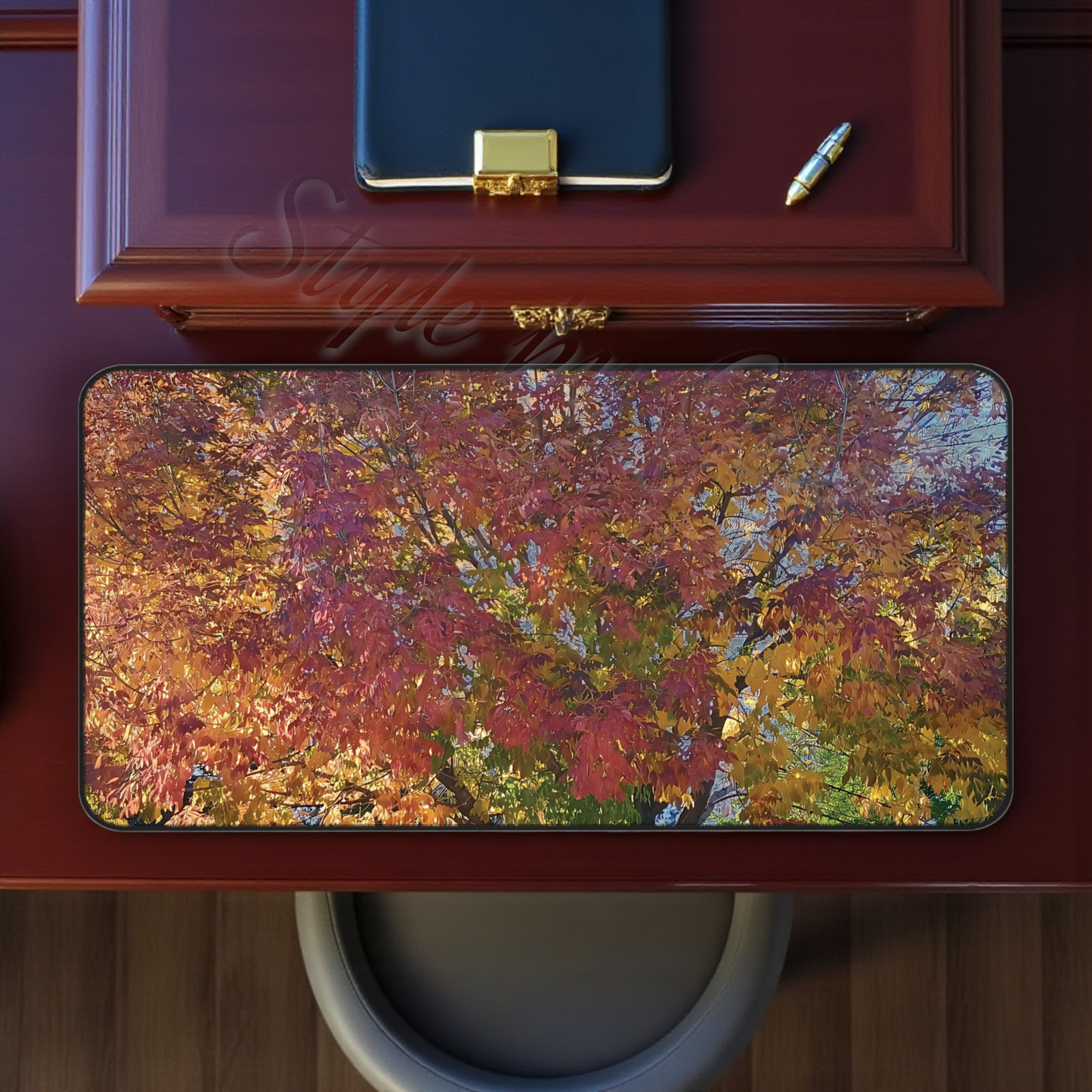 Colorful autumn-themed large mouse pad on a luxury wooden desk with a decorative box a Style By Jess.
